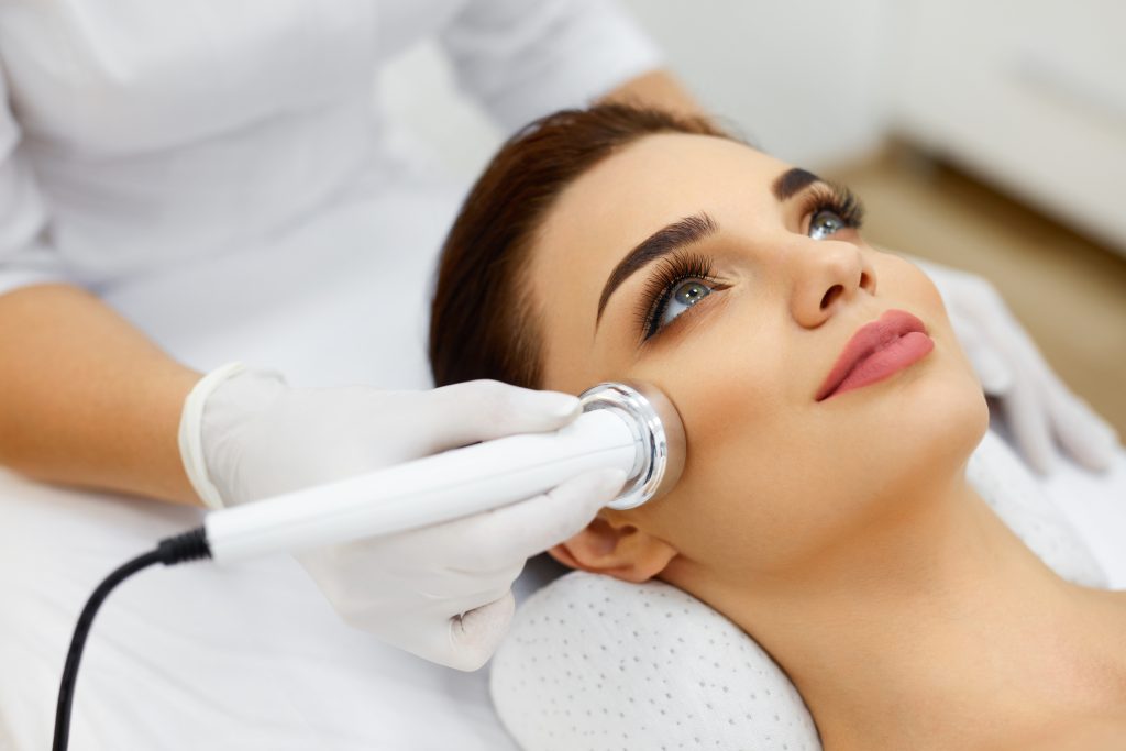 Cosmetology.,Beautiful,Woman,Receiving,Facial,Skin,Ultrasound,Cavitation.,Closeup,Of